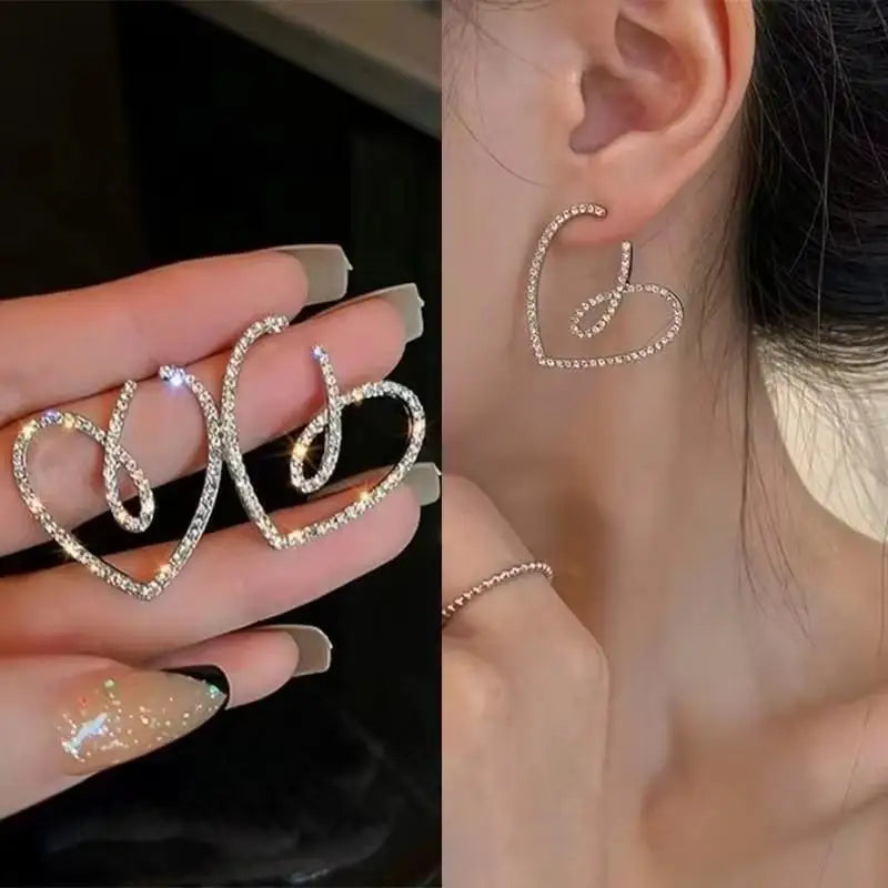 Gold and white Korean fashion zircon pendant earrings with dangling design for women, stylish and elegant jewelry.