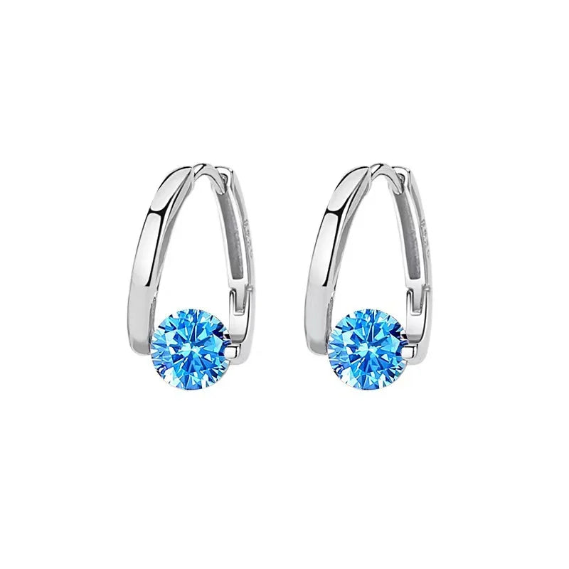 Gold and white Korean fashion zircon pendant earrings for women, featuring elegant drop design with sparkling stones.