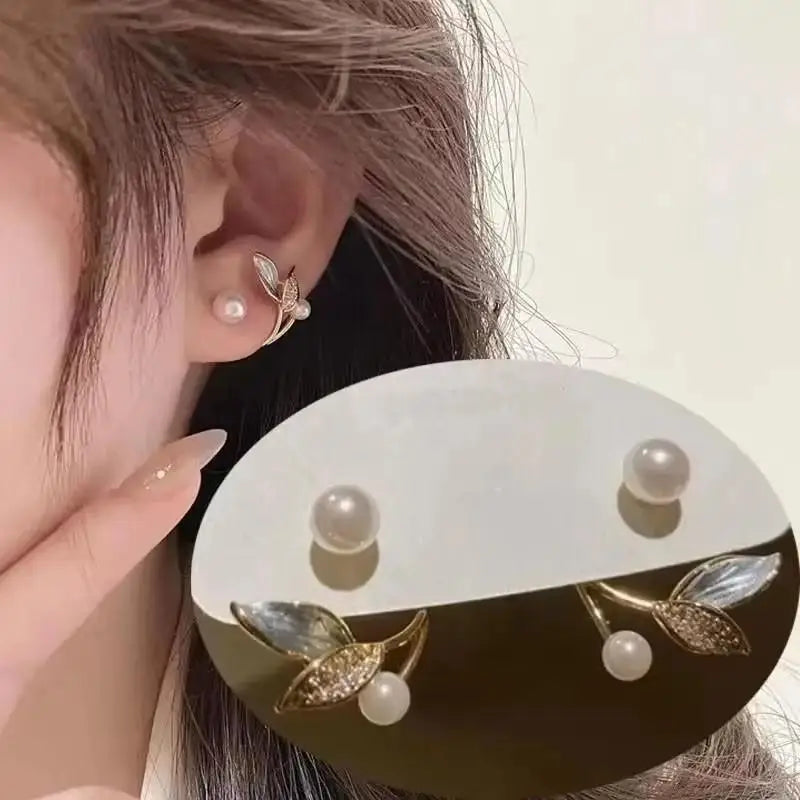 Gold and white Korean fashion zircon pendant earrings with dangling design, stylish jewelry for women.