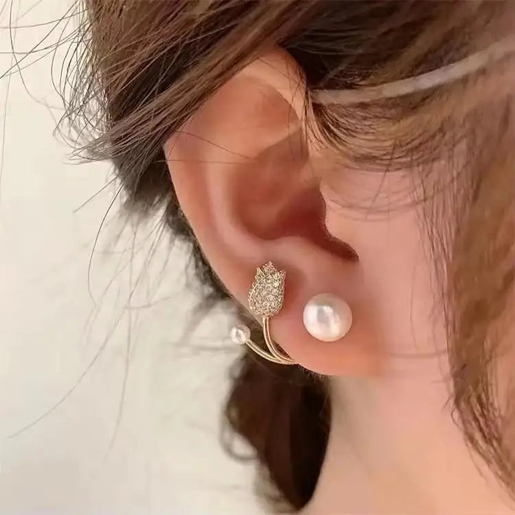 Gold and white Korean fashion zircon dangling earrings with intricate design, perfect for stylish women.