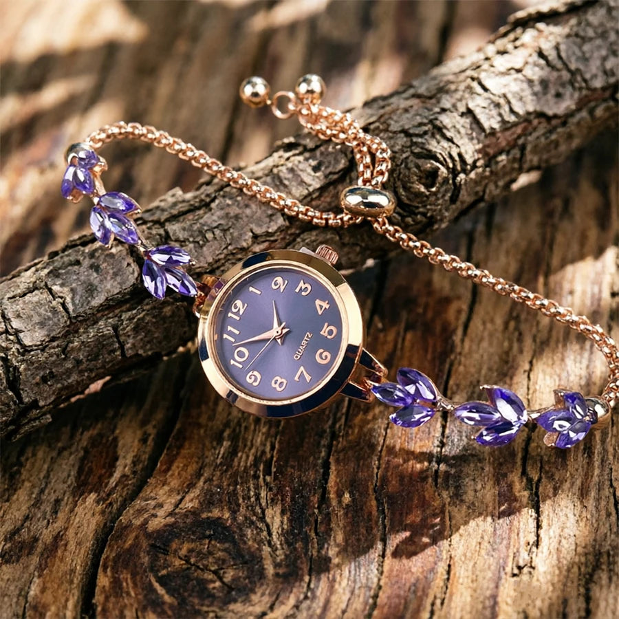Elegant black and gold adjustable bracelet watch with crystal cord, featuring a sleek design from Corporación Turística.