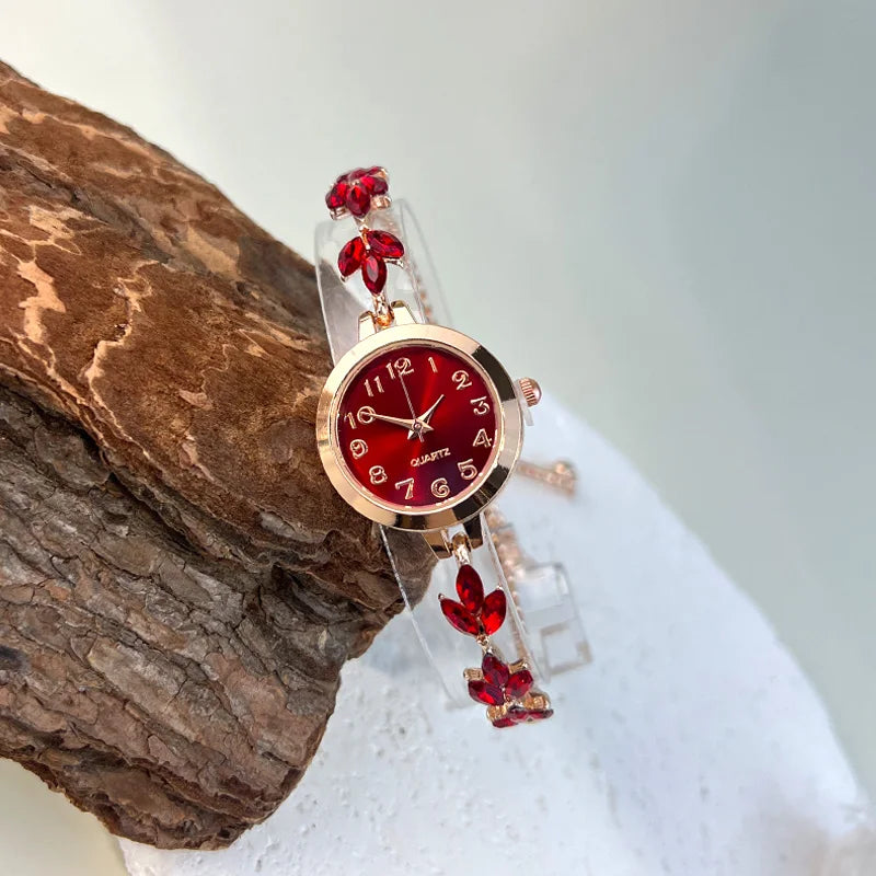 Elegant black and gold adjustable bracelet watch with crystal cord from Corporación Turística, featuring a sleek, modern design.
