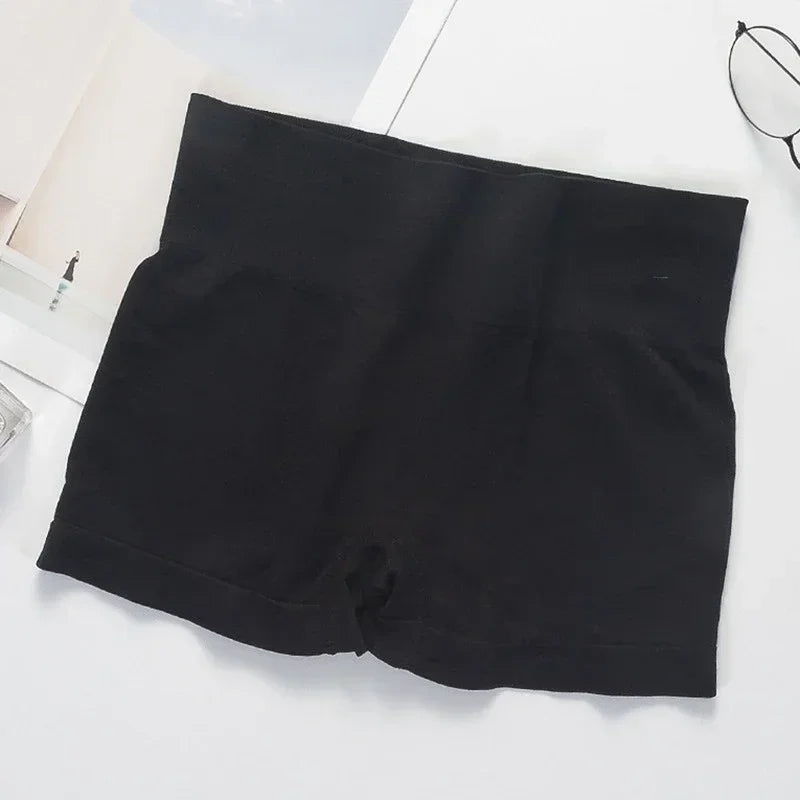Four pairs of gray women's fitted safety shorts from Corporación Turística, designed for secure fit and comfort.