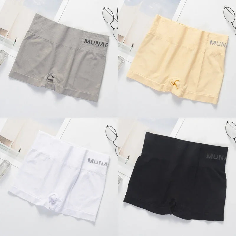 Set of four gray women's fitted safety shorts from Corporación Turística, designed for secure fit and comfort.
