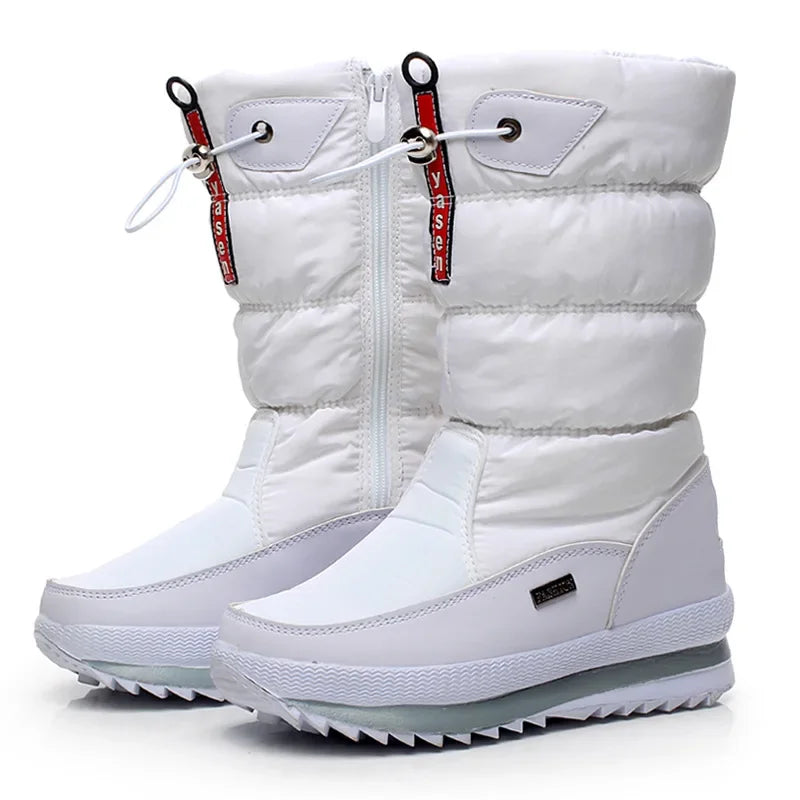 Gray women's fashionable winter snow boots by Corporación Turística, featuring warm insulation and sturdy soles for cold weather.