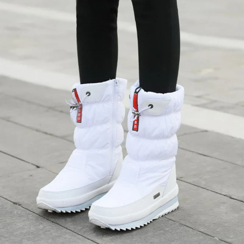 Gray women's fashionable winter snow boots by Corporación Turística, insulated and stylish for cold weather.