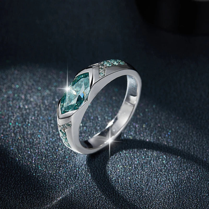 Set of five green NeeTim moss agate marquise-cut rings, each 5x10mm, from Corporación Turística, showcasing intricate gemstone design.