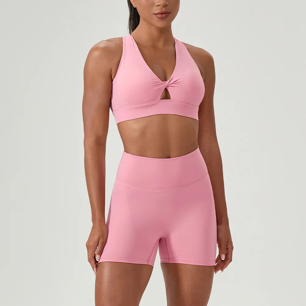 Green Naked Yoga Set by Corporación Turística featuring a sexy sports bra and matching yoga bottoms in a comfortable, stylish design.