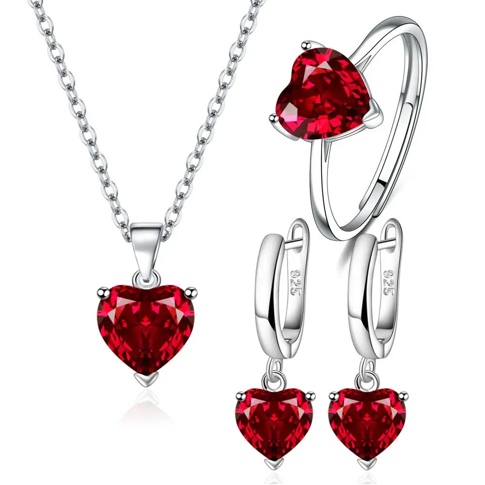 Green SAIYE jewelry set in sterling silver 925 for women, includes necklace and earrings, displayed on a white background.