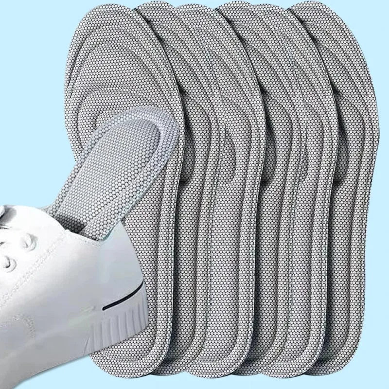 Set of 10 pairs of grey orthopedic memory foam insoles by Corporación Turística, designed for comfortable foot support.