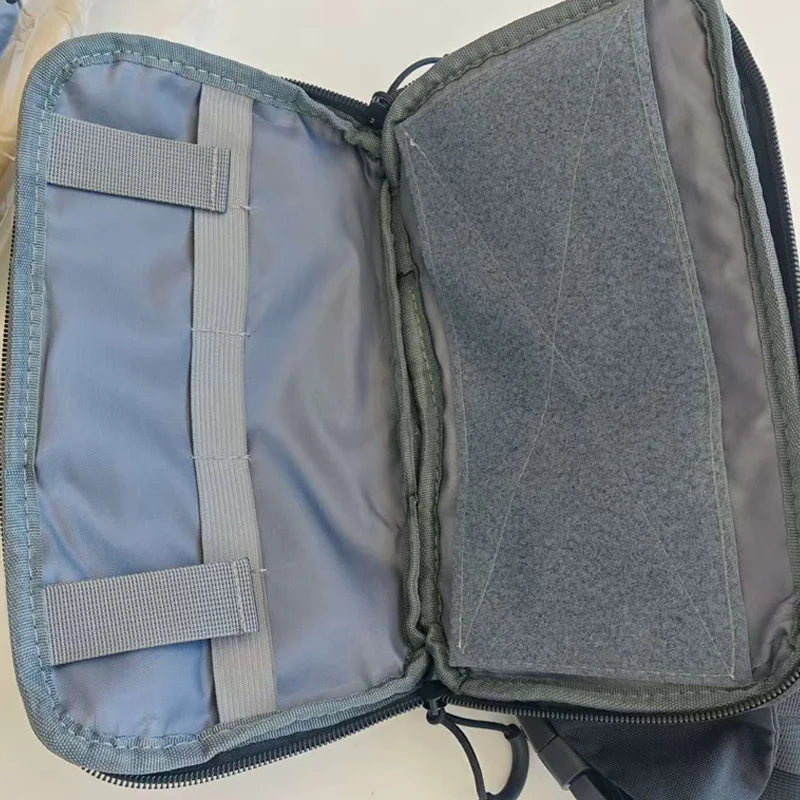 Grey tactical waist bag for men by Corporación Turística, ideal for hiking and climbing activities.