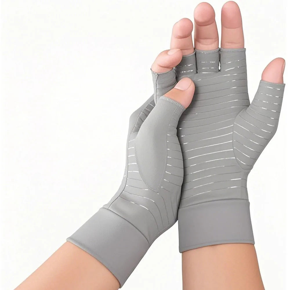 Pair of light gray fingerless compression gloves for adults by Corporación Turística, designed to ease arthritis discomfort.