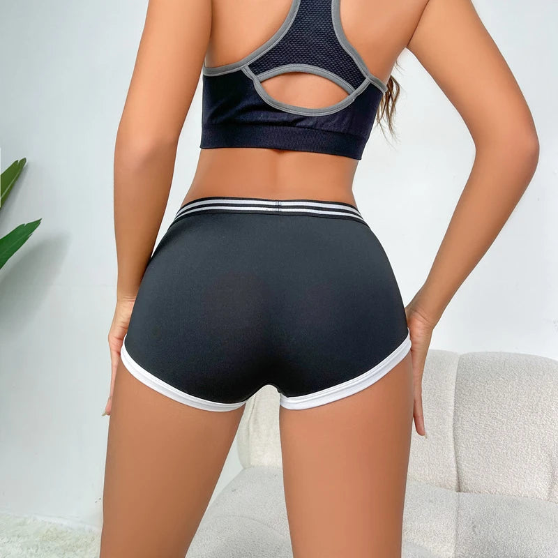 High-waisted women's pants by Corporación Turística with lift and shaping effect, featuring a sleek fit and stylish design.