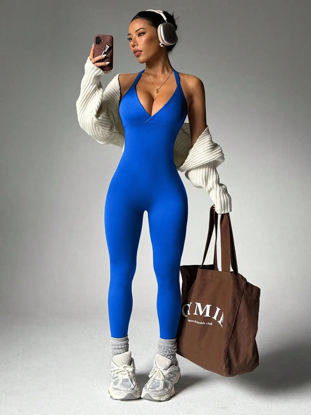 Black yoga compression leggings without back and sleeves from Corporación Turística, designed for comfortable active wear.