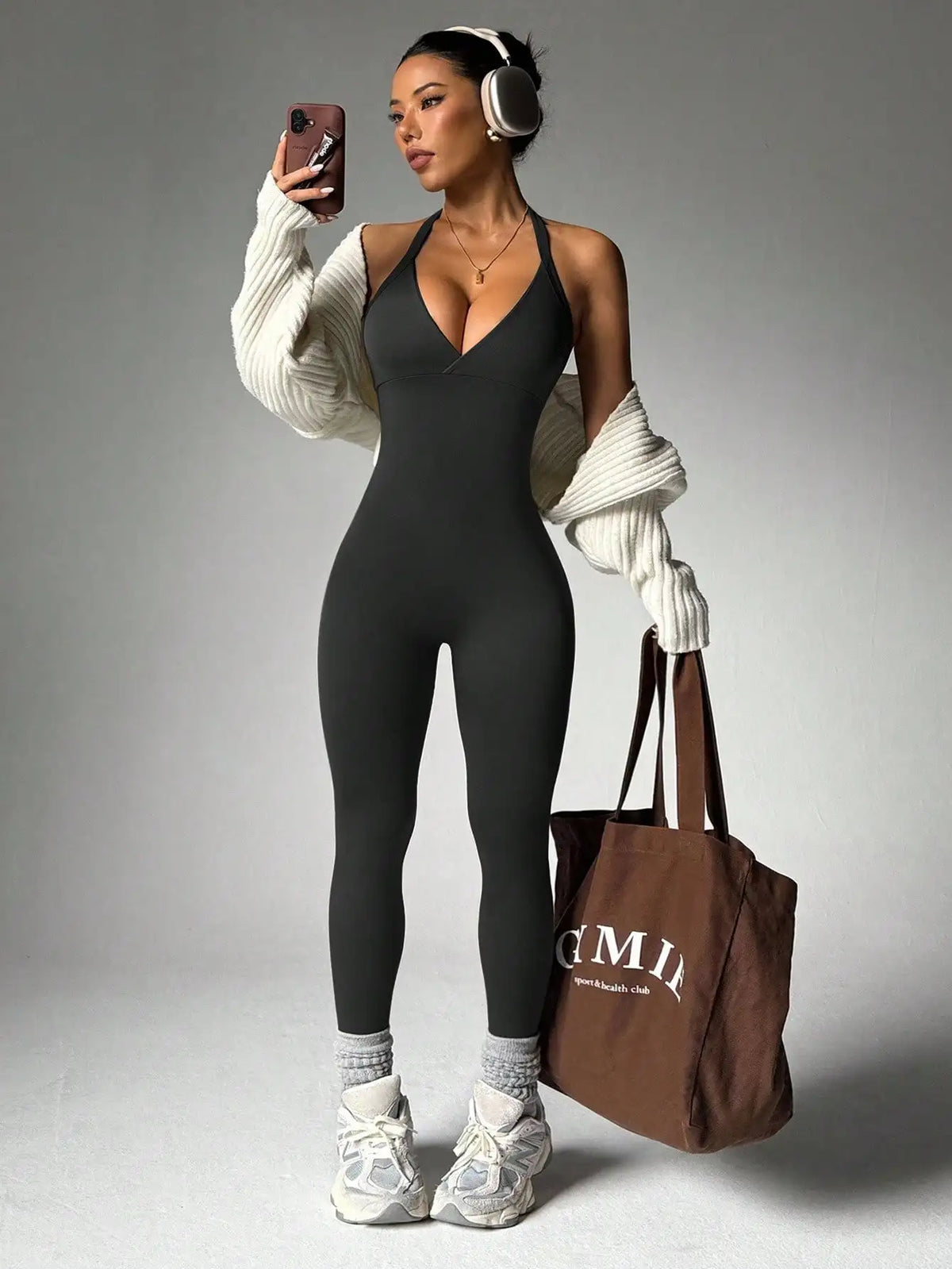 Yoga compression leggings from Corporación Turística, backless and sleeveless, designed for comfort and flexibility during exercise.