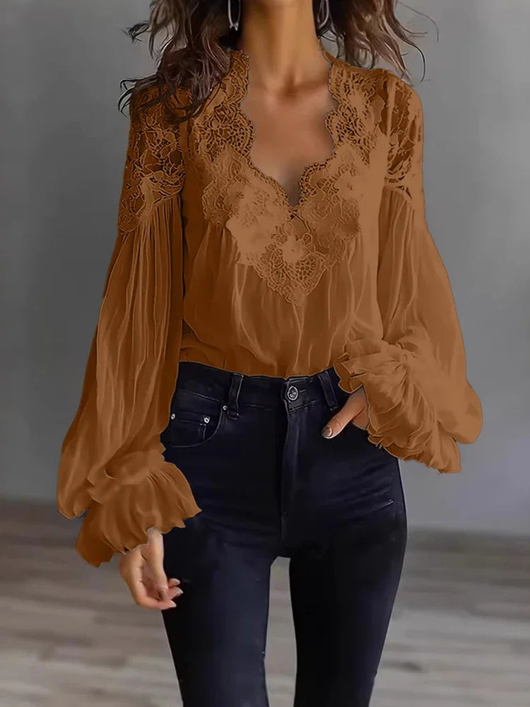 White lace blouse with deep V-neck and long sleeves, stylish and elegant, by Corporación Turística.