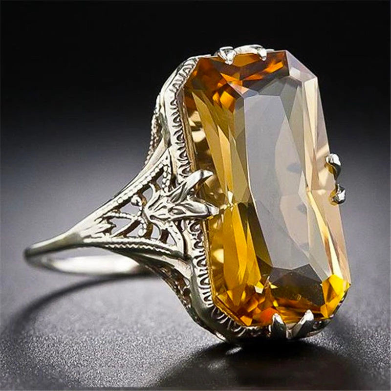 Retro square crystal ring by Corporación Turística featuring carved hollow design and unique vintage style.