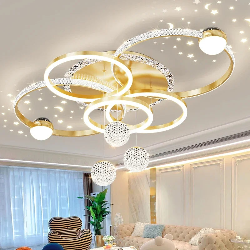 Modern gold LED ceiling lamp by Corporación Turística with adjustable brightness, sleek and elegant design for contemporary lighting.
