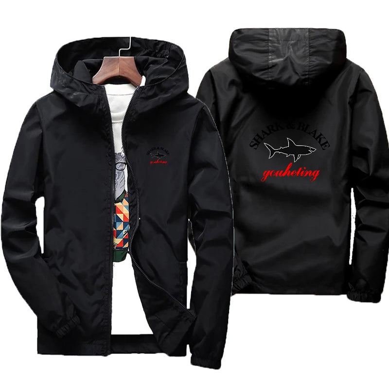 Waterproof hooded jacket for men and women by Corporación Turística, featuring a durable design and vibrant color.