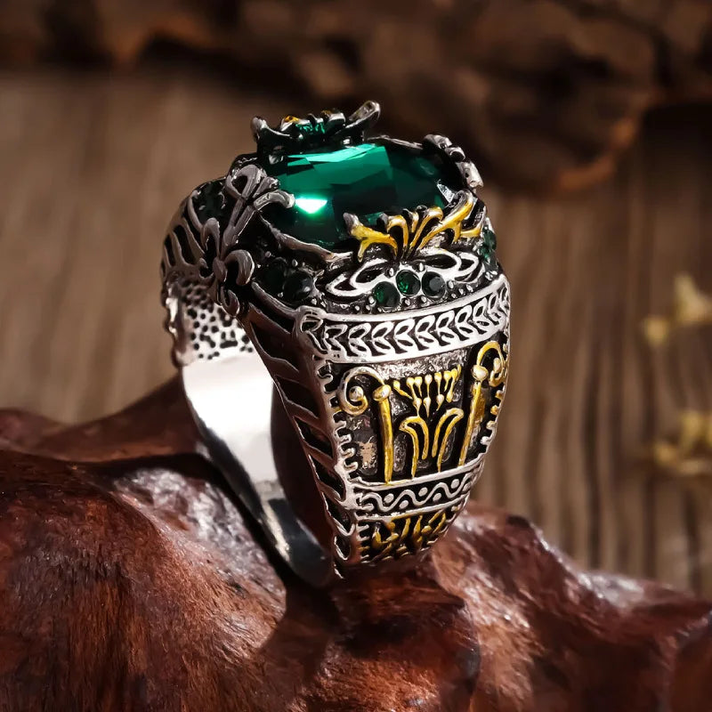Elegant men's silver ring with a large green stone, vintage style, perfect for parties and special occasions.