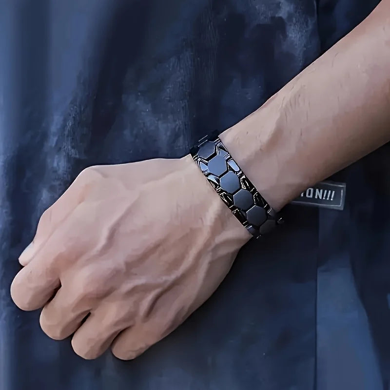 Black titanium magnetic bracelet for men with hexagonal design, removable links, stylish men's jewelry for gifts.