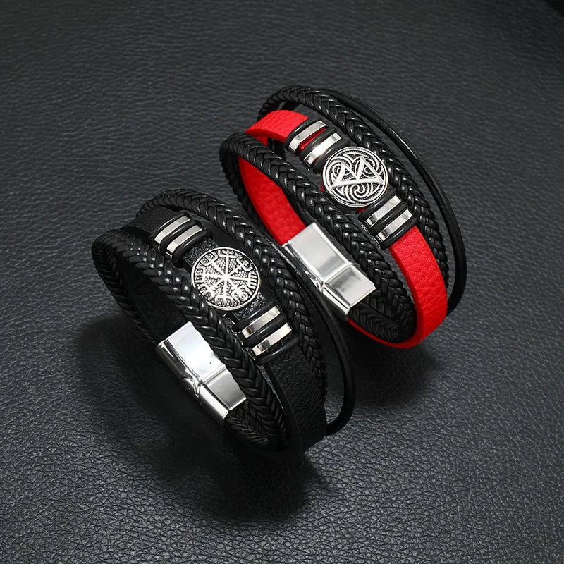 Black leather men's bracelet with multi-layer braid, compass charm, and evil eye bead, crafted by Corporación Turística.