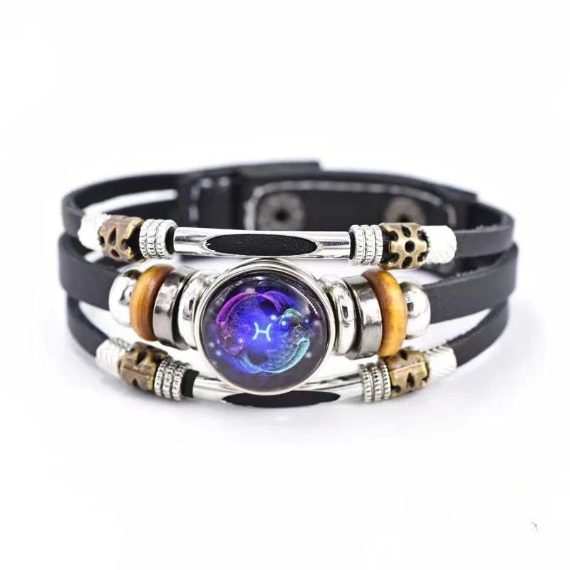 Unisex leather constellation bracelet with multiple layers featuring Sagittarius sign, part of Corporación Turística's jewelry collection.