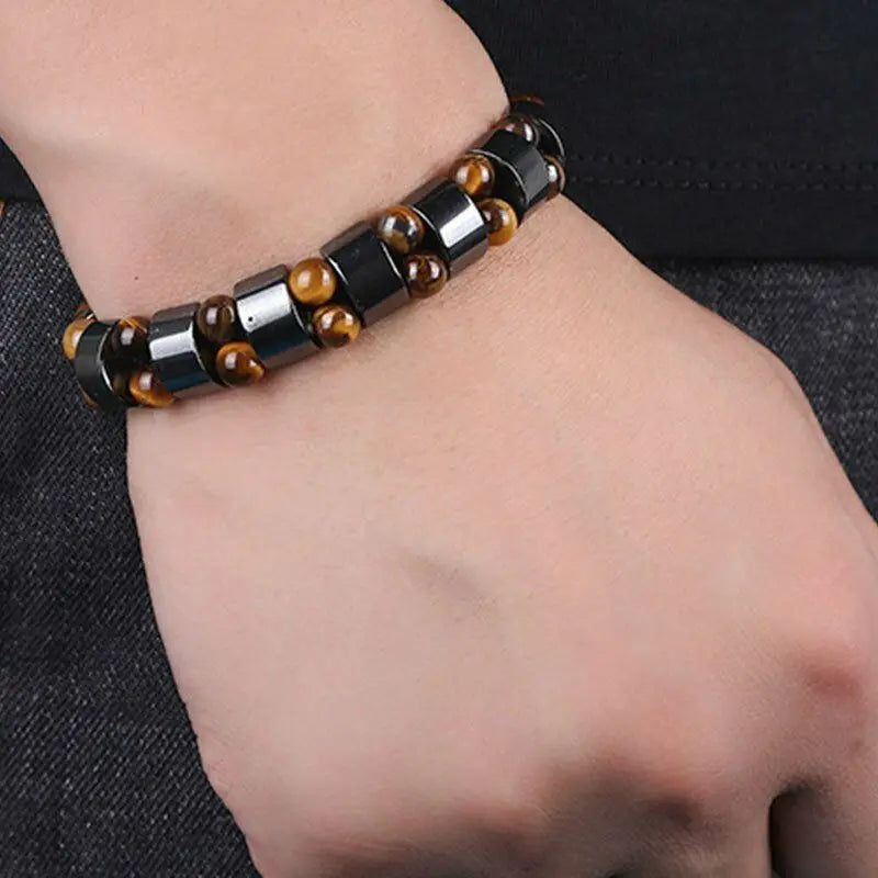 Elegant tiger's eye men's bracelet featuring natural red stone, durable jewelry design, crafted by Corporación Turística.