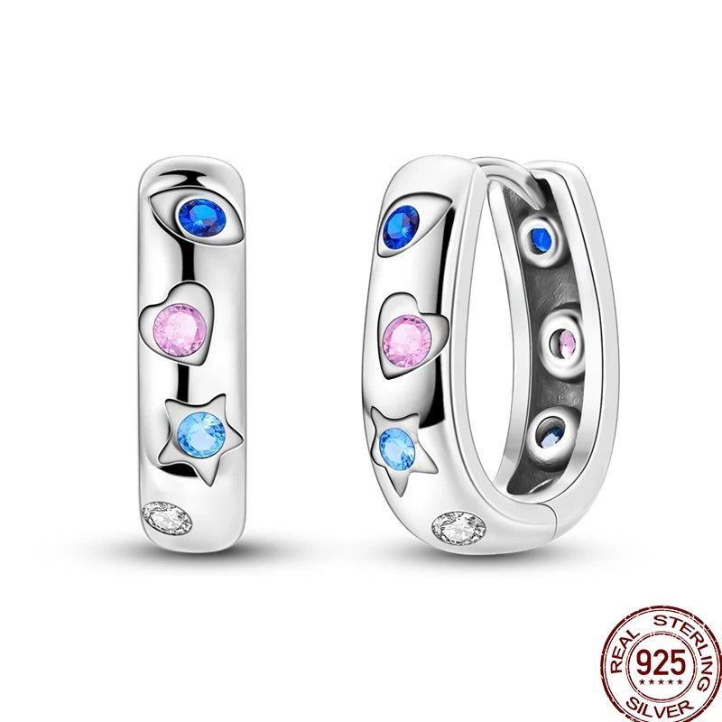 Colorful sterling silver 925 earrings featuring circus-themed design, crafted by Corporación Turística.
