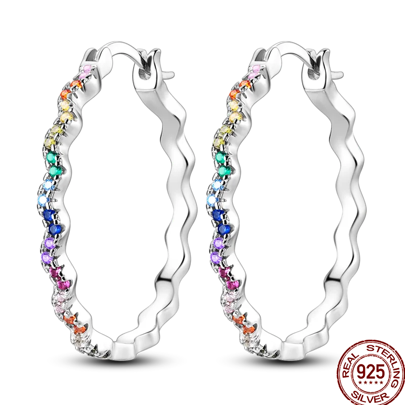 Colorful sterling silver 925 earrings featuring circus-inspired design, crafted by Corporación Turística.