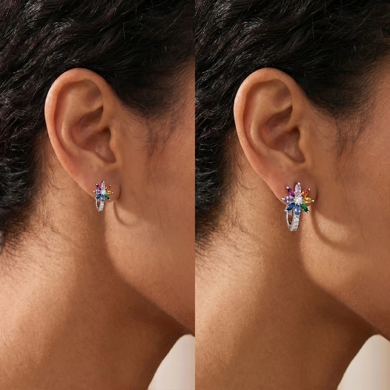 Silver 925 hoop earrings from Corporación Turística featuring original design, polished metal finish, and classic circular shape.