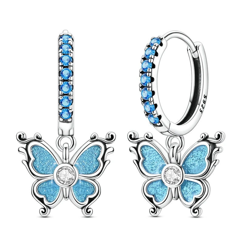 Silver 925 hoop earrings by Corporación Turística, original jewelry featuring stylish round hoop design.