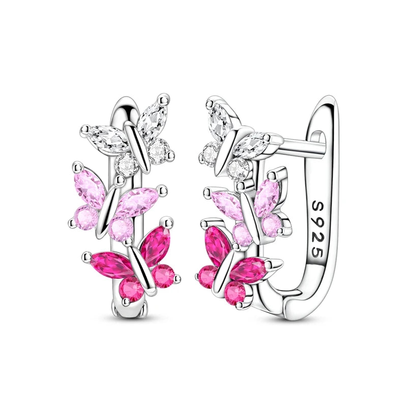 Silver 925 hoop earrings by Corporación Turística, original jewelry with sleek round design, shiny finish, and secure clasps.