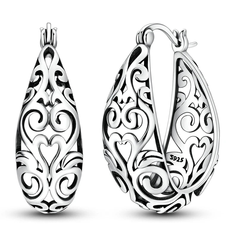 Silver 925 hoop earrings by Corporación Turística featuring classic round design, perfect for stylish everyday wear.