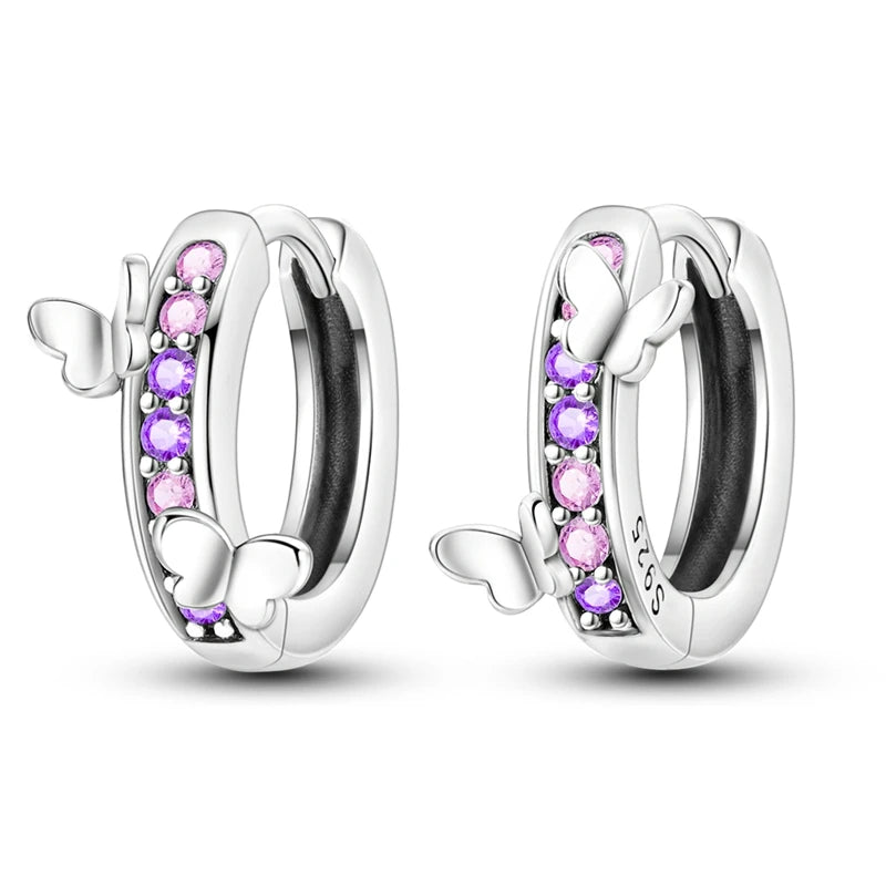 Silver 925 hoop earrings from Corporación Turística, featuring original design with polished finish and classic circular shape.