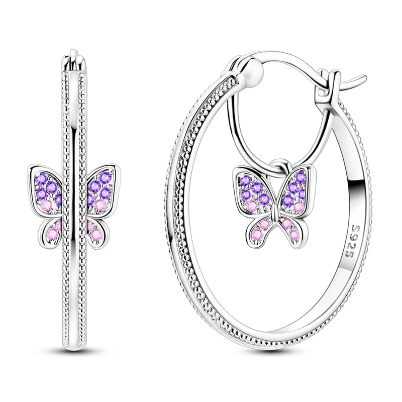 Sterling silver hoop earrings by Corporación Turística, stylish and original jewelry featuring 925 silver hoops.