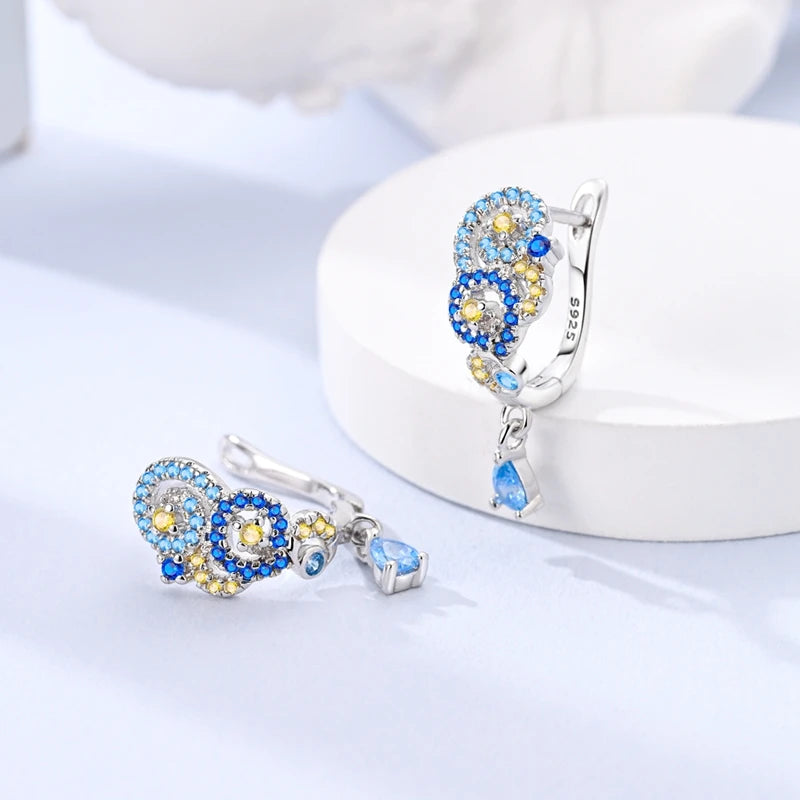 Silver Van Gogh Starry Night earrings featuring a night sky design, perfect for elegant evening wear.