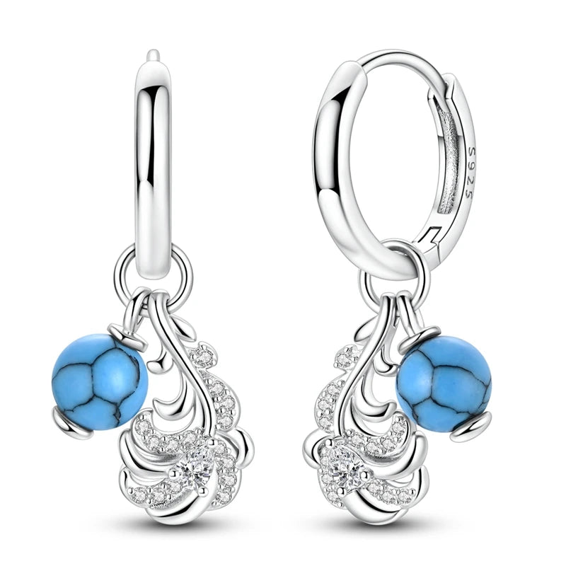 Sterling silver 925 earrings for women with sparkling zirconia stones, elegant jewelry from Corporación Turística.