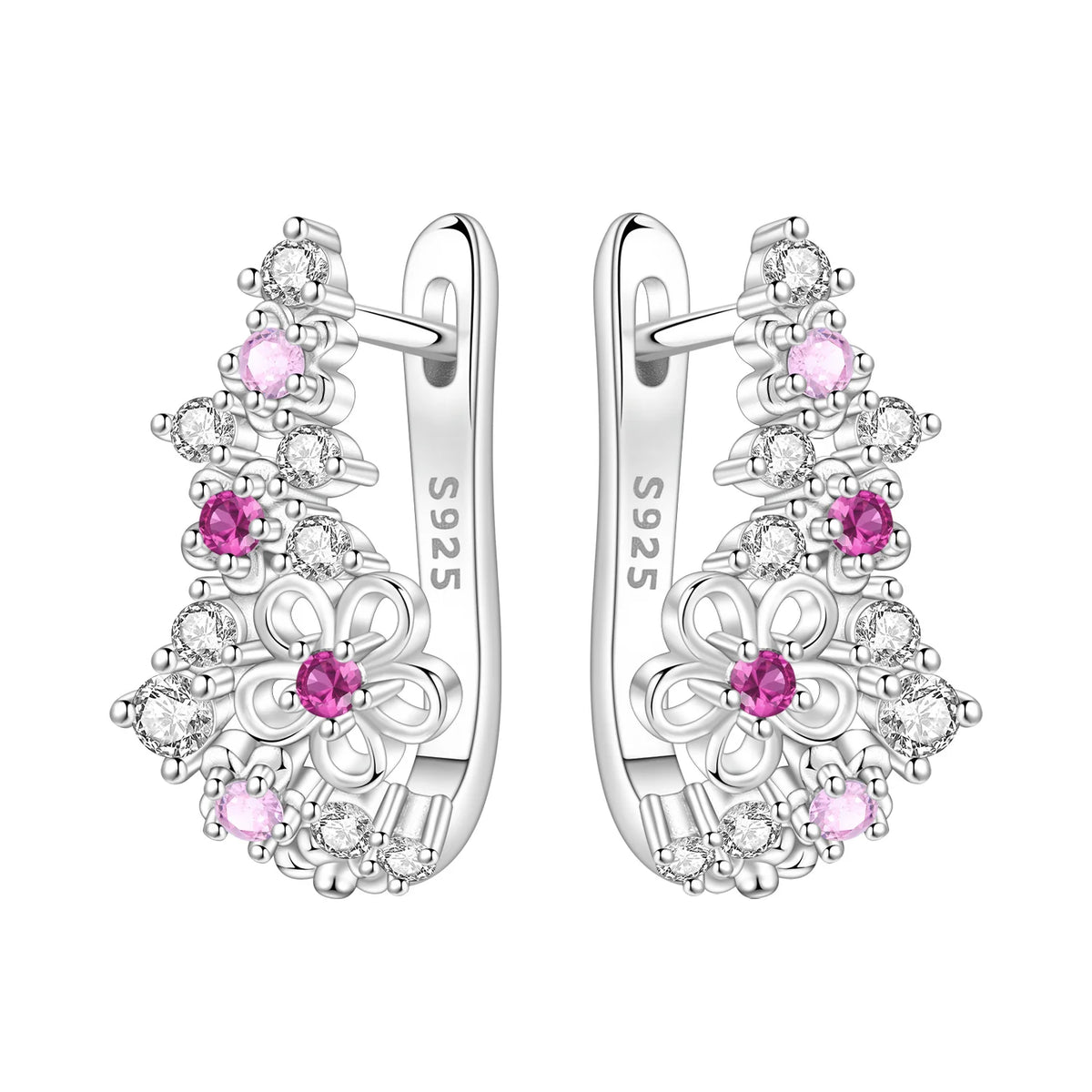 Silver hoop earrings with leaf and flower designs, featuring intricate craftsmanship by Corporación Turística.