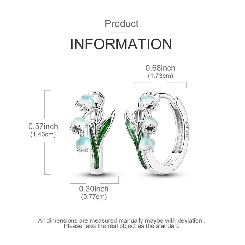Silver hoop earrings with leaf and flower design, featuring intricate detailing and elegant craftsmanship by Corporación Turística.