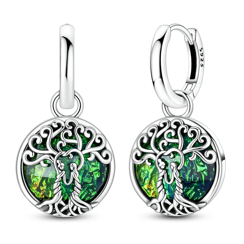 Sterling silver 925 earrings with cubic zirconia in tree design, elegant jewelry by Corporación Turística.