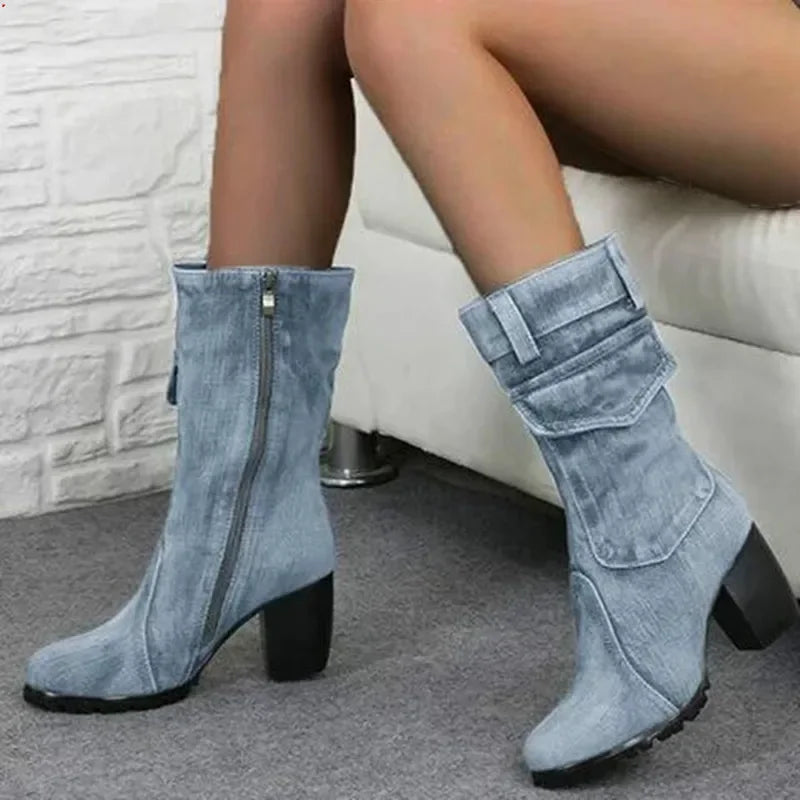 Light blue cowboy boots for women with pointed toes and stacked heels, crafted by Corporación Turística.