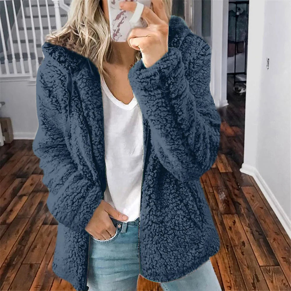 Light grey women's thick coat with hood and zipper from Corporación Turística, shown in XXL size, front view.