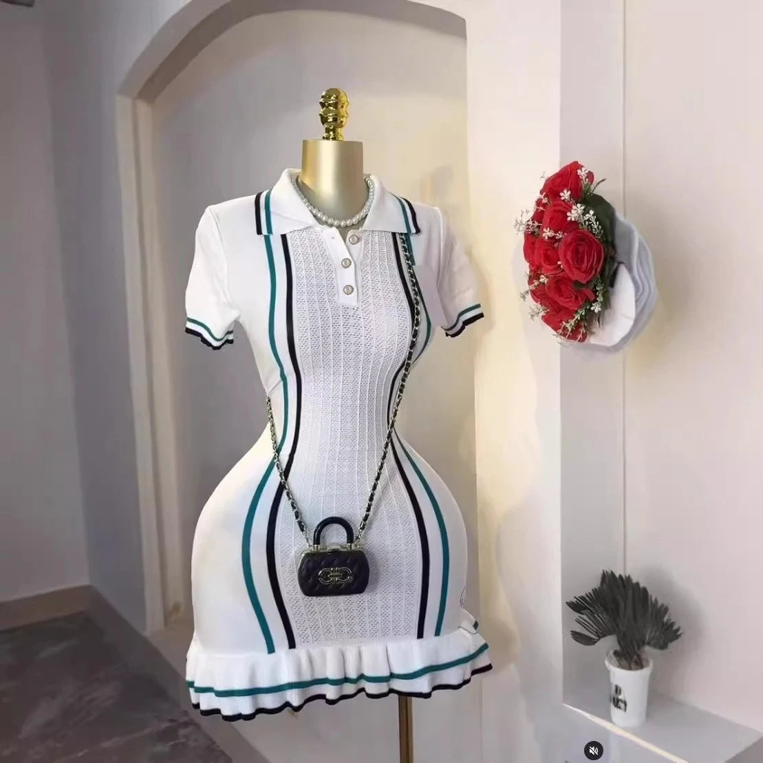 Elegant YuooMuoo mini dress with long sleeves, fitted design, and textured fabric, showcasing a stylish and sexy look.