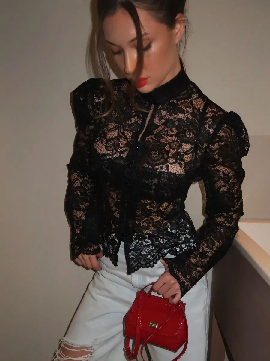 Elegant black lace blouse for women by Corporación Turística, featuring a delicate thread collar and intricate lace details.