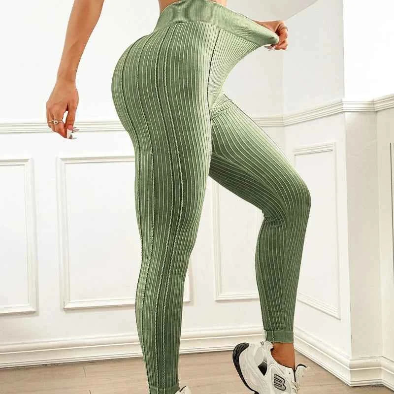 High-waisted women's leggings from Corporación Turística with a washed effect, green color, and comfortable fit.