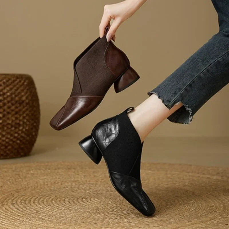 Brown ankle boots with block heel and square toe from Corporación Turística, shown on size 38.