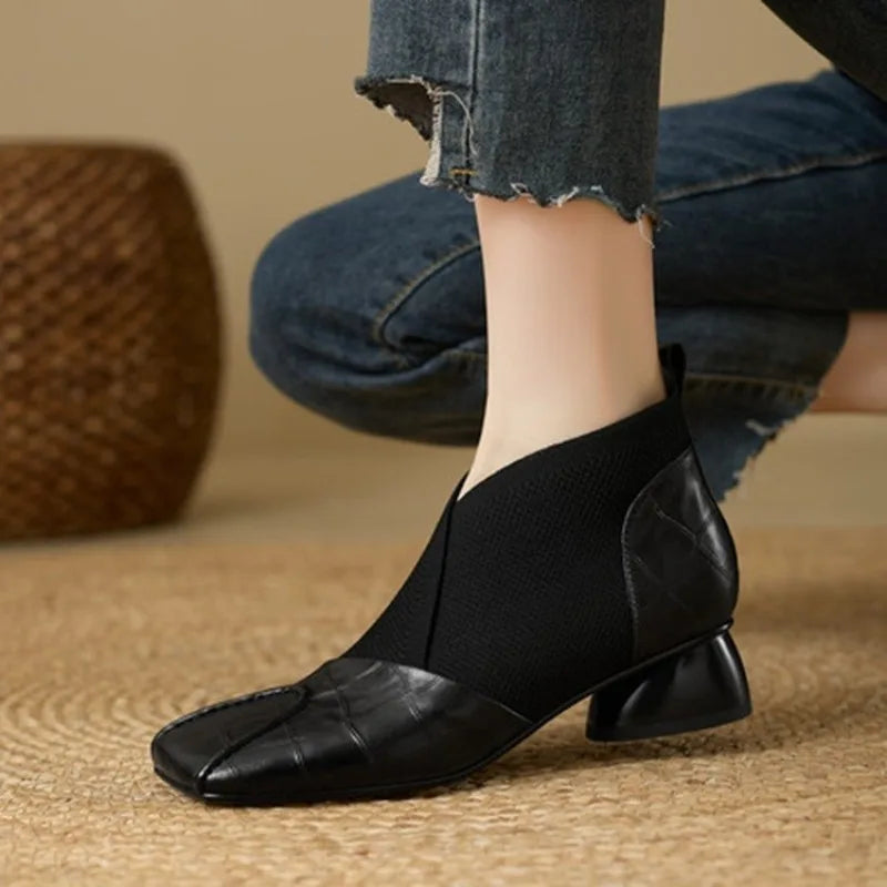 Brown ankle boots with block heels and square toes, stylish footwear by Corporación Turística, size 38.