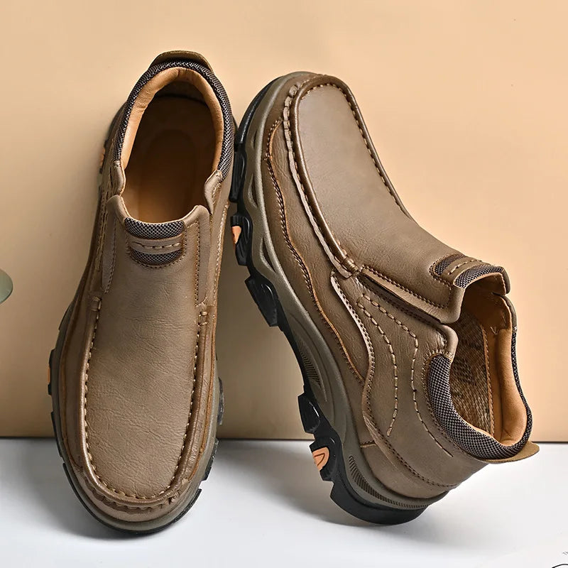 Men's brown genuine leather sports sneakers by Corporación Turística, featuring a sleek athletic design and comfortable fit.