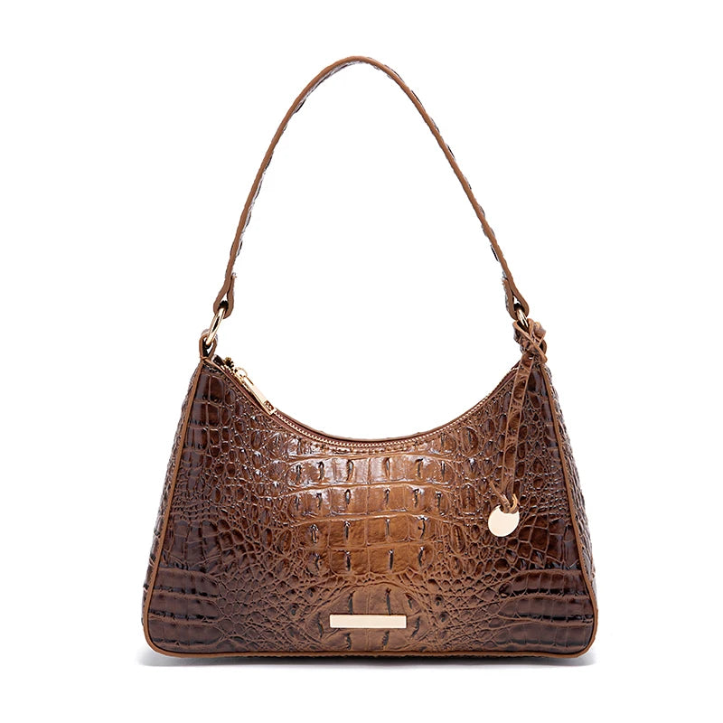 Light brown versatile women's handbag with spacious interior, featuring multiple compartments and stylish design from Corporación Turística.